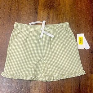 Dillards girls green and cream gingham shorts with ruffles. Size 5.